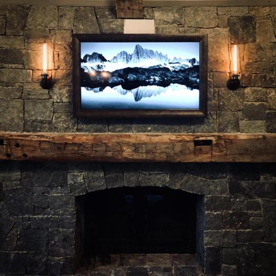 Framed Flat Screen TV above the mantel - Talie Jane Interiors