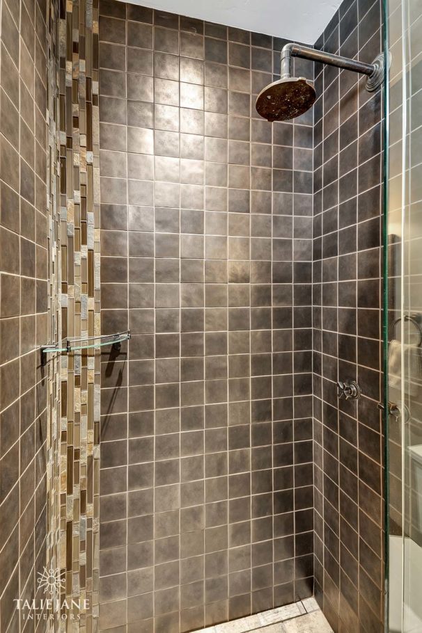 Black tile bathroom with shower