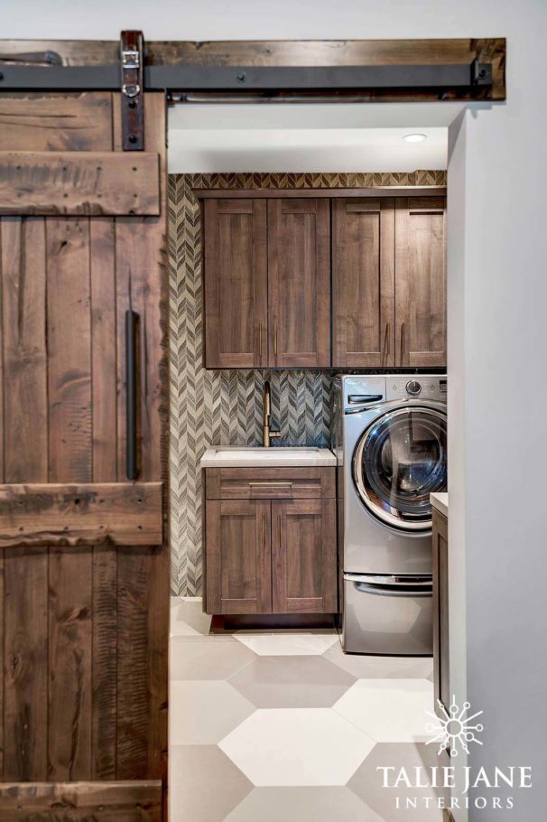 Wooden door and cabinets and brown and white flooring
