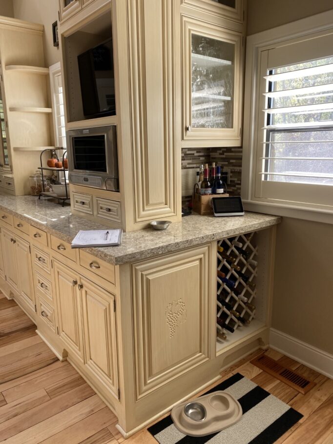 Wooden cabinet of a kitchen with stone top